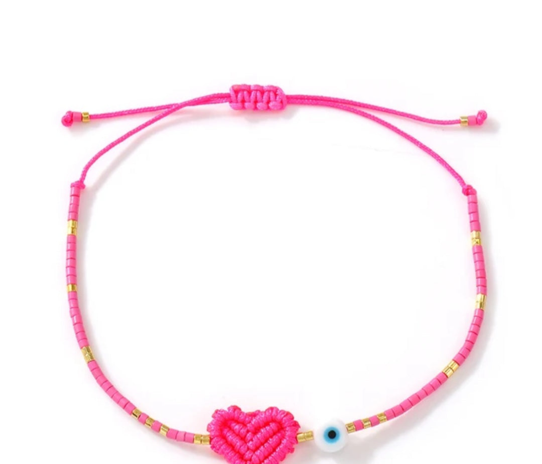 Adjustable handmade friendship bracelets with evil eye