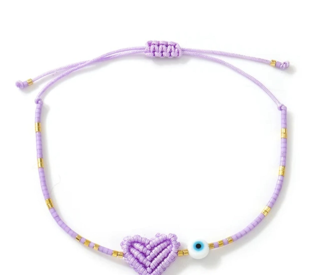 Adjustable handmade friendship bracelets with evil eye