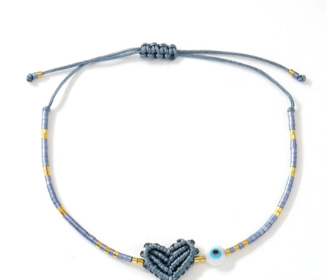 Adjustable handmade friendship bracelets with evil eye