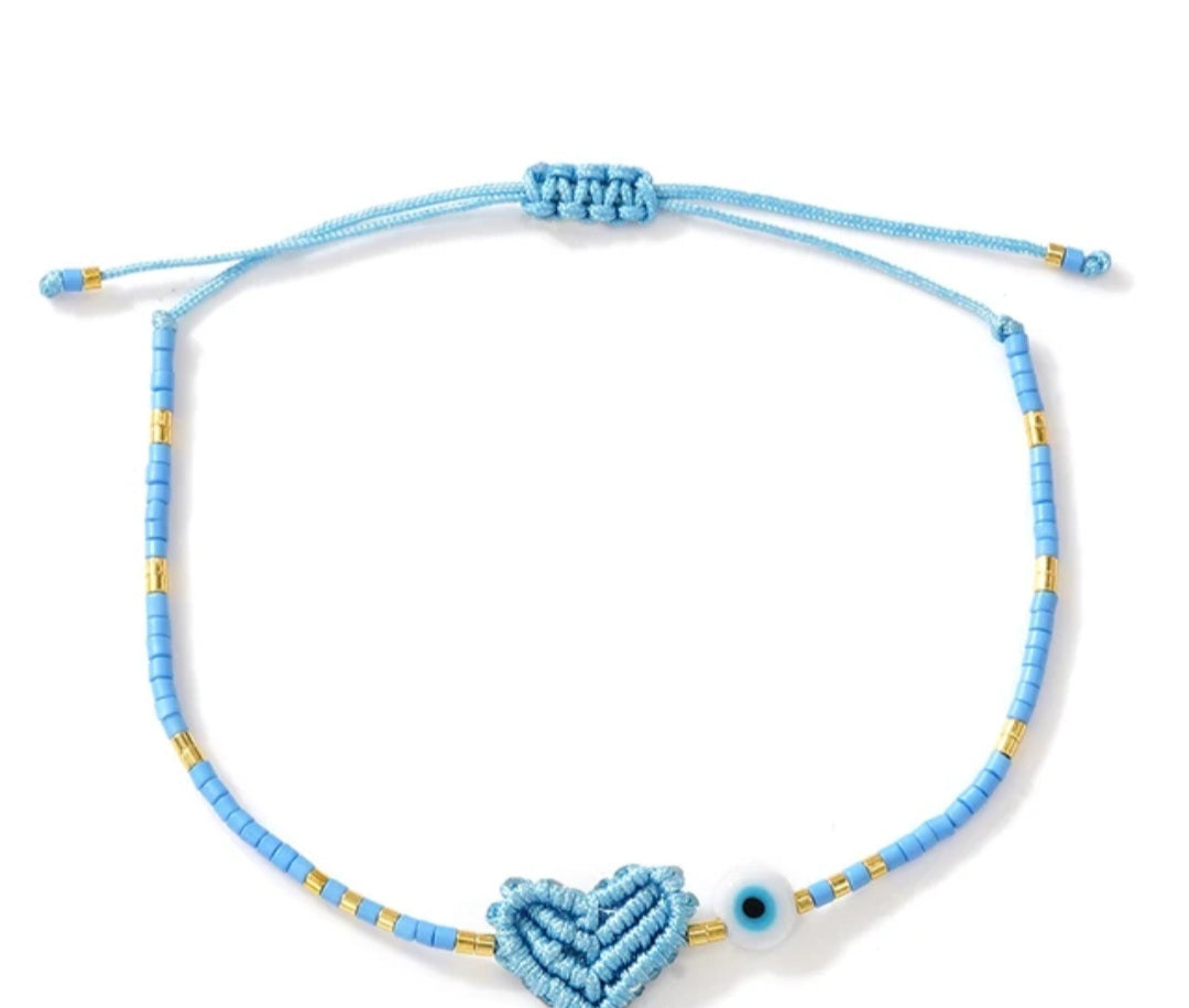 Adjustable handmade friendship bracelets with evil eye