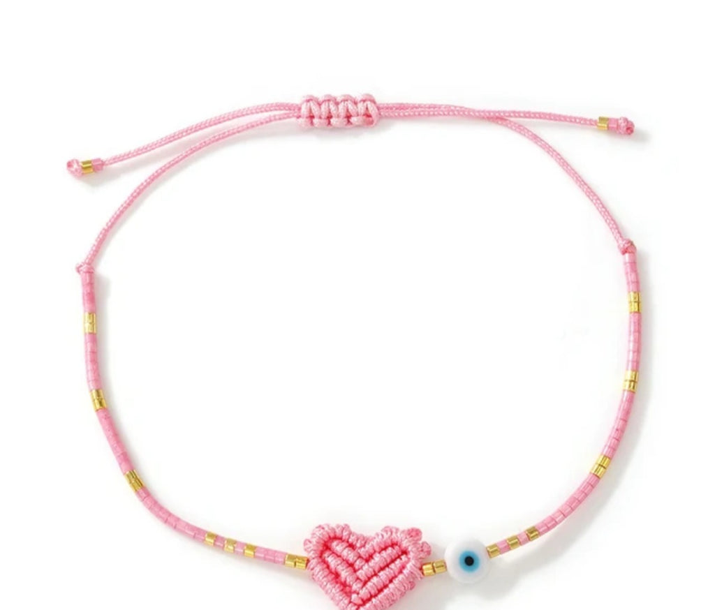 Adjustable handmade friendship bracelets with evil eye