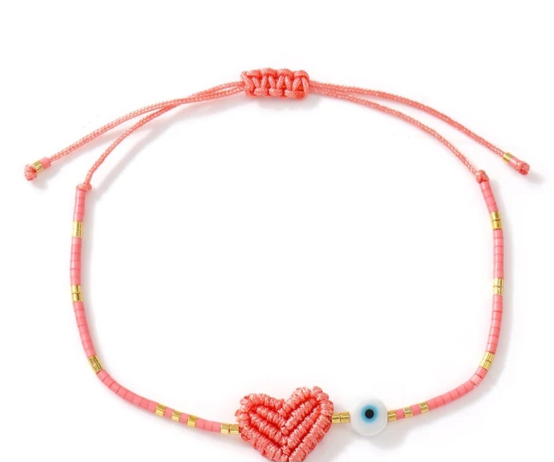 Adjustable handmade friendship bracelets with evil eye