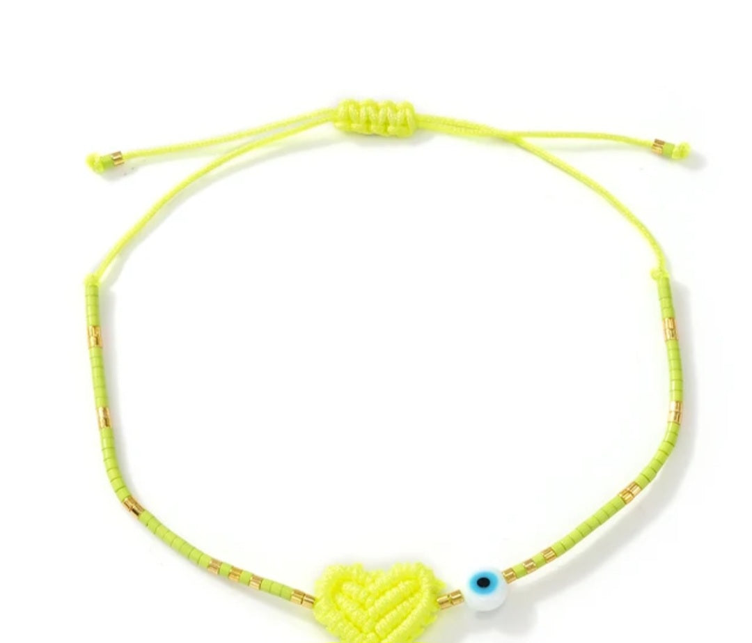 Adjustable handmade friendship bracelets with evil eye