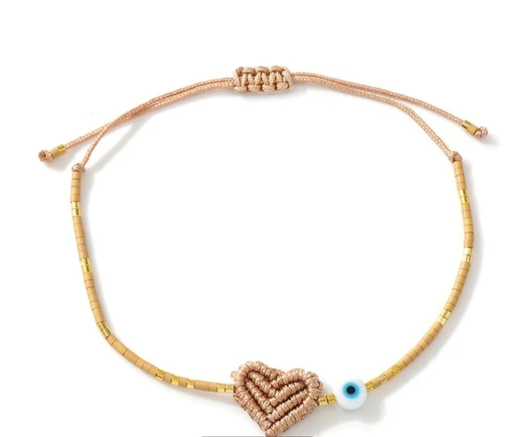 Adjustable handmade friendship bracelets with evil eye