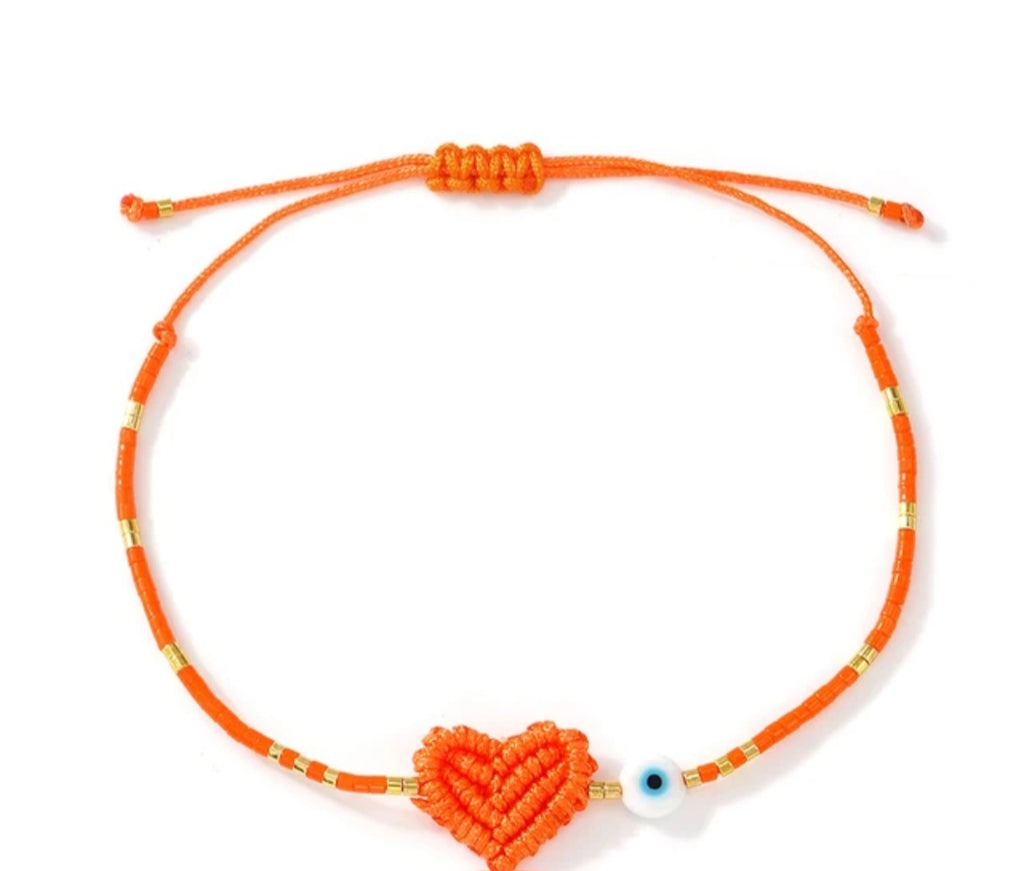 Adjustable handmade friendship bracelets with evil eye