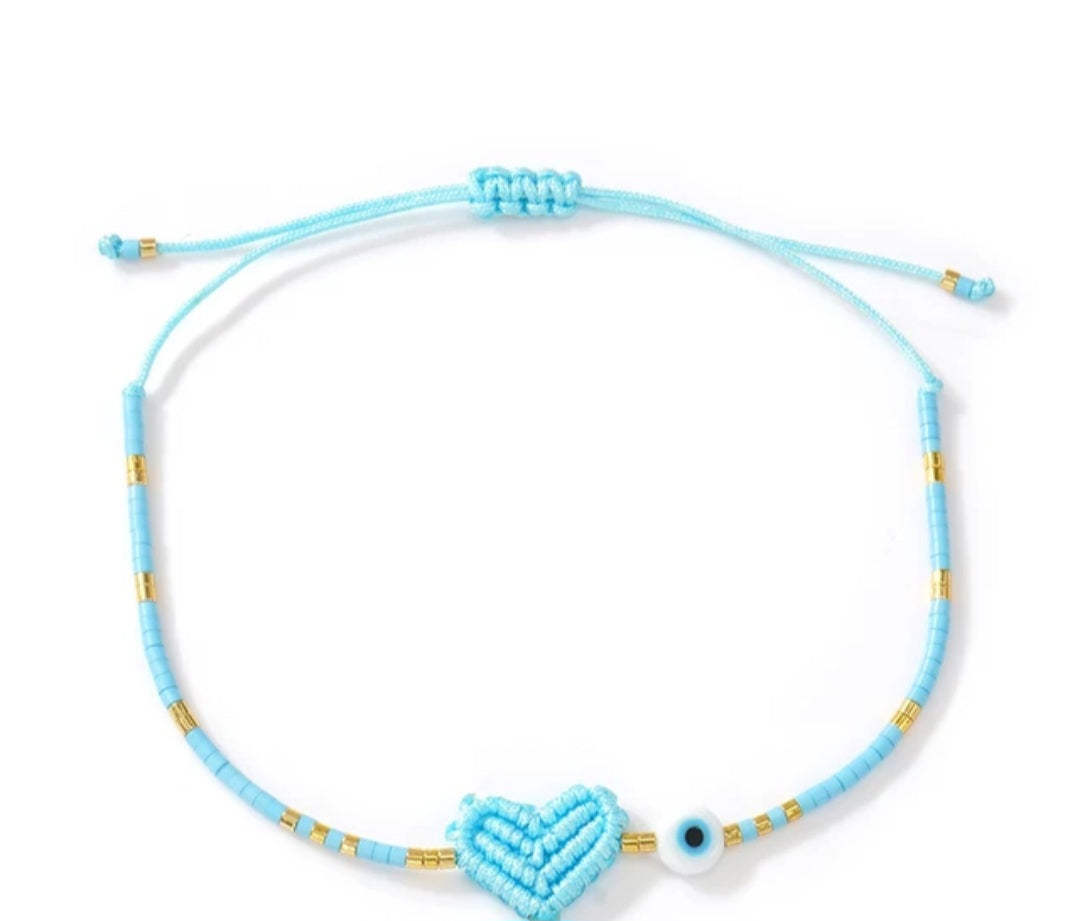 Adjustable handmade friendship bracelets with evil eye