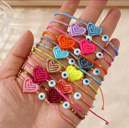 Adjustable handmade friendship bracelets with evil eye